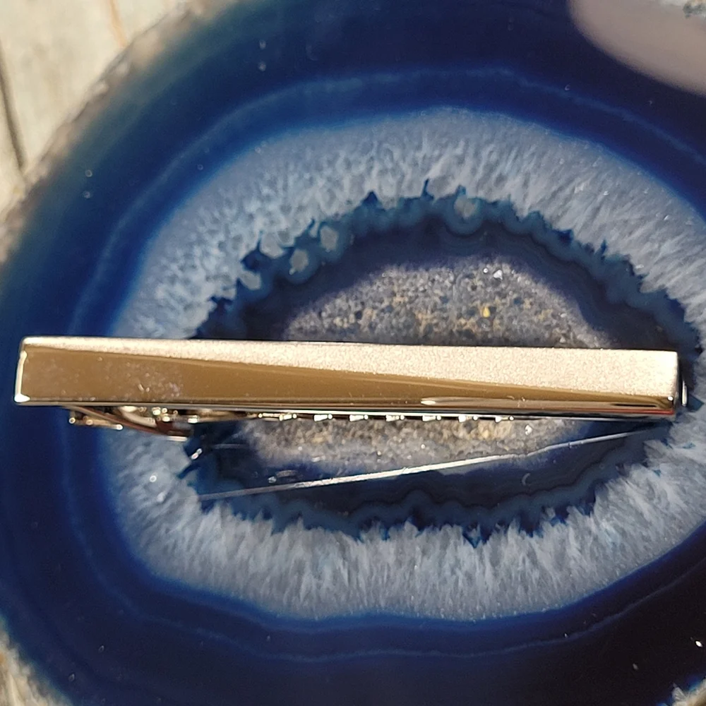 Cuff Links and Tie clip.